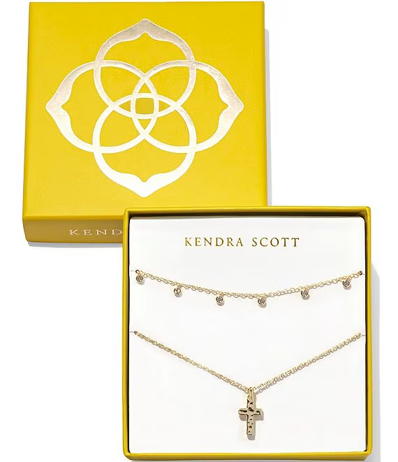 Gift set of 2 necklaces. Comes with box. Both necklaces are gold. One necklace is the amelia chain necklace with small crystals throughout the necklace. other necklace has the cross pendant.