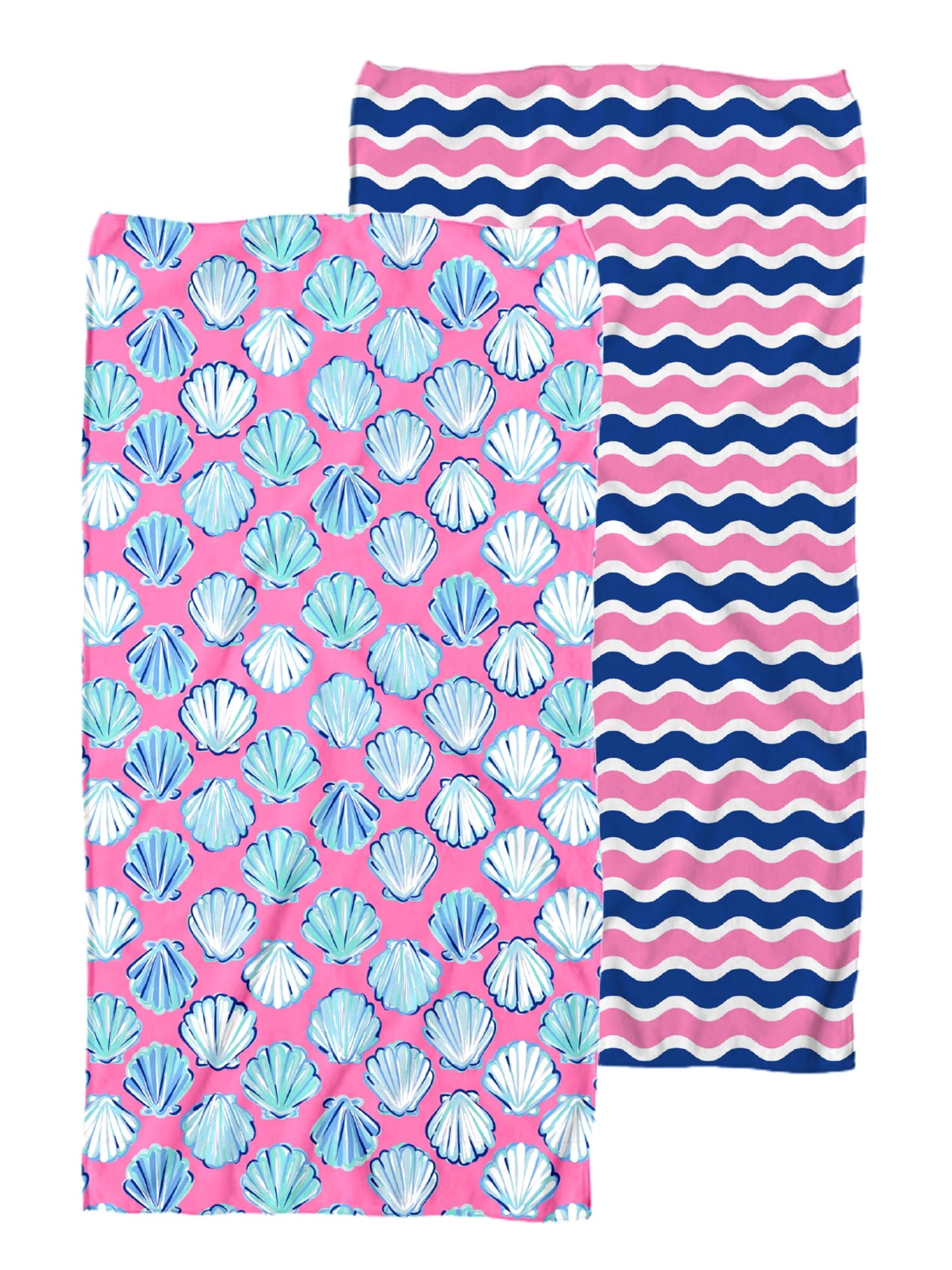 two sided towel. one side is a pink base with blue seashells and the other side is navy, white, and pink waved lines. 