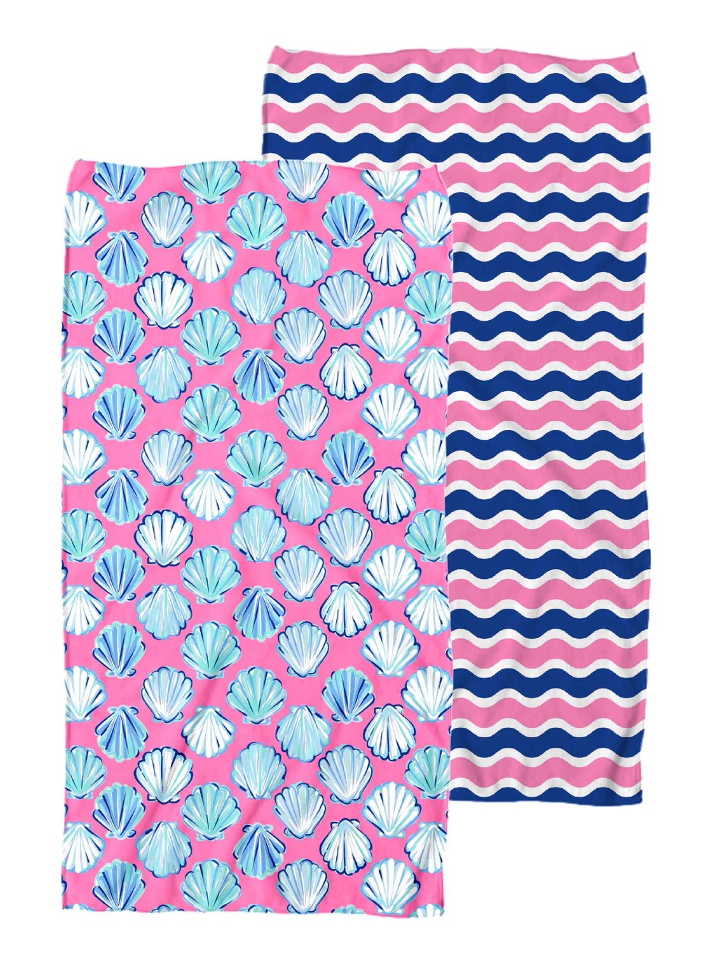 two sided towel. one side is a pink base with blue seashells and the other side is navy, white, and pink waved lines.
