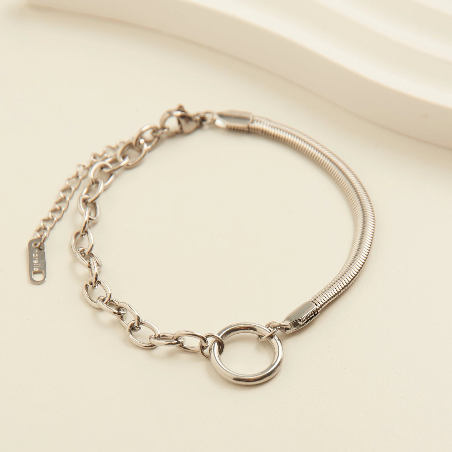 Sliver Cable and Snake Chain Bracelet with a circle detail connecting them, lobster clasp