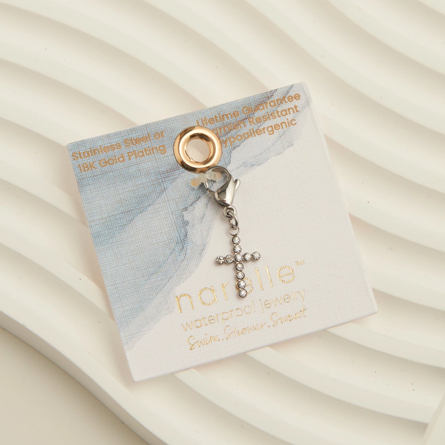 Sliver cross charms with cubic zirconia detail and a lobster clasp