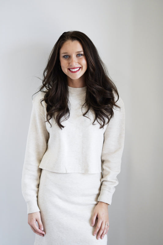 Serena Relaxed Sweater Round Ribbed Neckline Long Cuffed Sleeves Raw Hem Color: Cream Relaxed Fit Skimmer Length