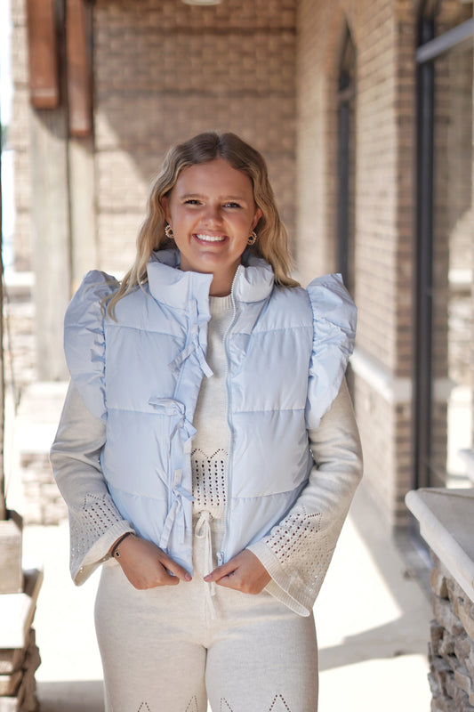 Cloud Blue Puffer Vest
Puffer Vest
Zipper Closure With Bow Detail
Full Length
Sleeveless
Color: Light Blue
Pockets
Fabric Content: 100% Polyester
Care Instructions: Hand Wash Cold