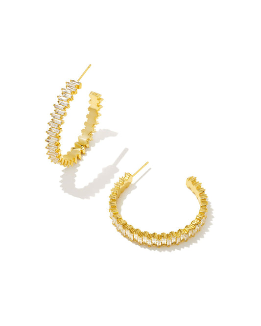 Make a statement in these edgy-meets-elegant hoops. The Juliette Gold Hoop Earrings in White Crystal feature glittering baguette crystals stacked to create a classic hoop silhouette. Dimensions- 1.54"L Outer Diameter Metal- 14k Yellow Gold Over Brass Closure- Ear Post Material- White Crystal