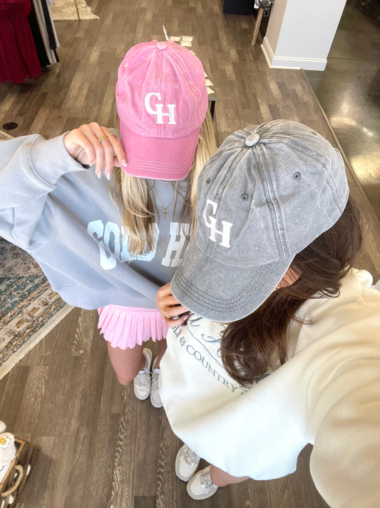 <ul> <li>Gold Hinge University Hat</li> <li>Color Options: Vintage Blossom and Vintage Grey color options </li> <li>White "GH' Initial Lettering</li> <li>Baseball Cap Style</li> </ul>