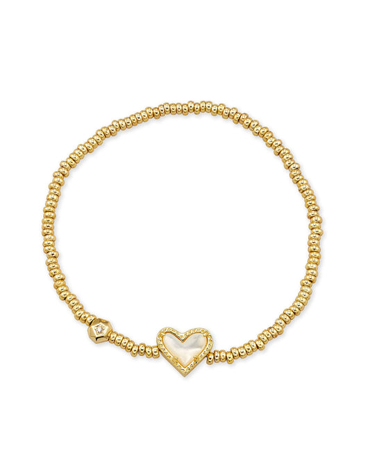 Like wearing your heart on your sleeve? Then the Ari Gold Heart Stretch Bracelet is perfect for you. Designed to fit any wrist, this minimal-yet-playful bracelet is the easiest way to bring some love and shine to your everyday stacks. Gold Dichroic Glass