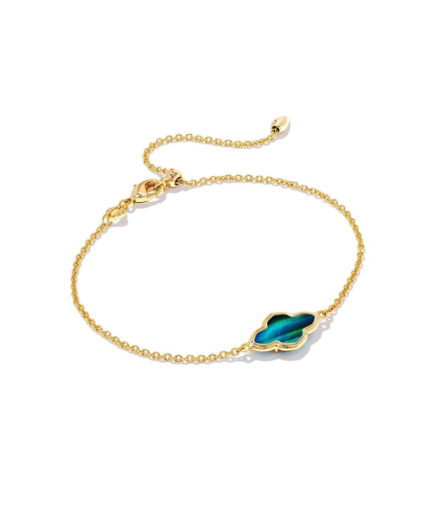 Add a classic KS shape to your arm stack with the Framed Abbie Gold Delicate Chain Bracelet. An elongated iteration of our iconic medallion, this delicate chain brings an eye-catching shine with its gorgeous stone center. Styled as a standalone piece or paired with your everyday faves, this chic bracelet is sure to become part of your daily rotation.