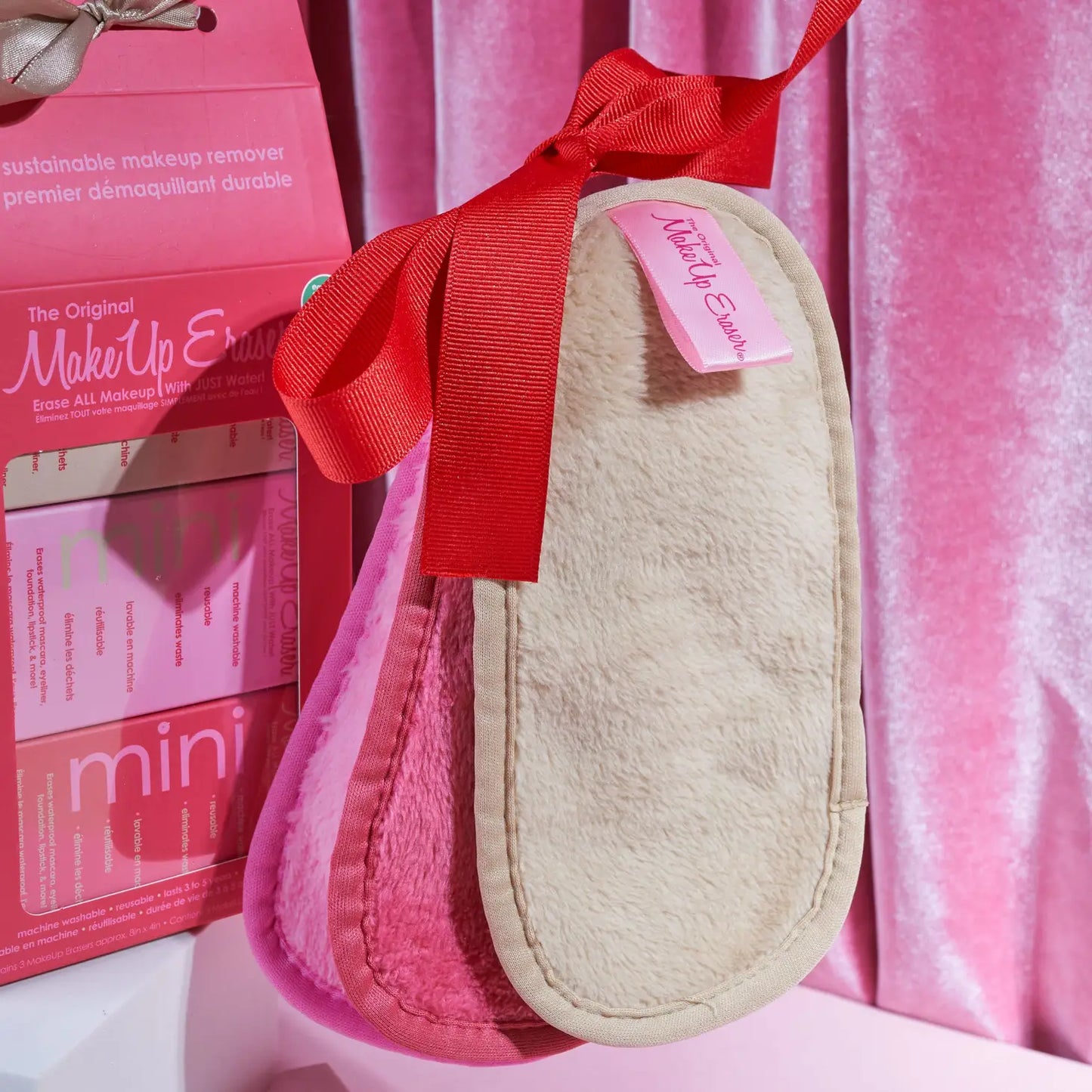 3 piece makeup eraser set with a pink a rose and a cream makeup eraser