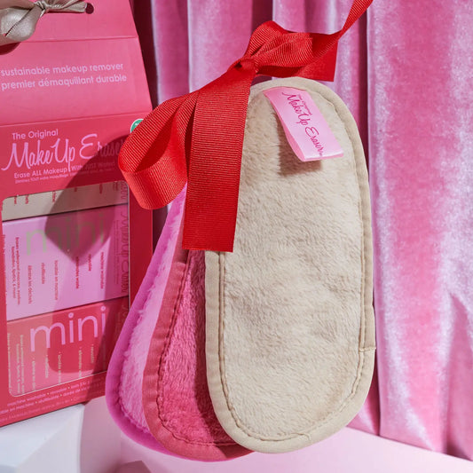 3 piece makeup eraser set with a pink a rose and a cream makeup eraser