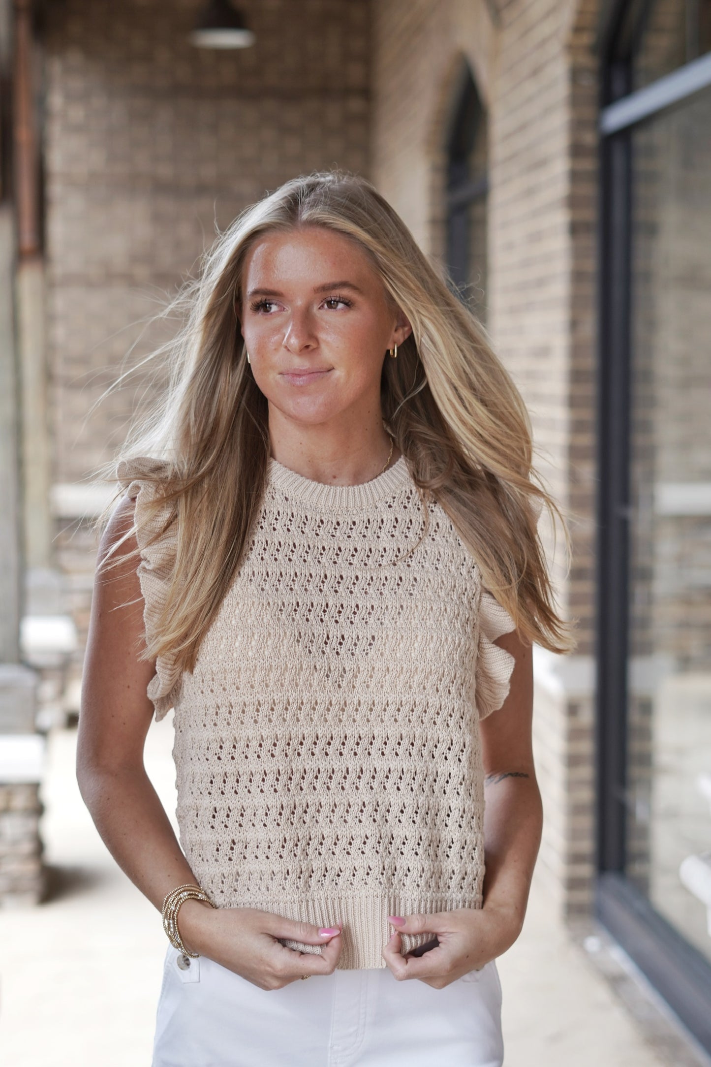 <ul> <li>Roxy Ruffle Sleeve Knit Top</li> <li>Round Neck</li> <li>Ruffle Short Sleeve</li> <li>Color: Natural</li> <li>Full Length</li> <li>Knitted Material</li> <li>55% Acrylic,45% Cotton</li> <li></li> </ul>