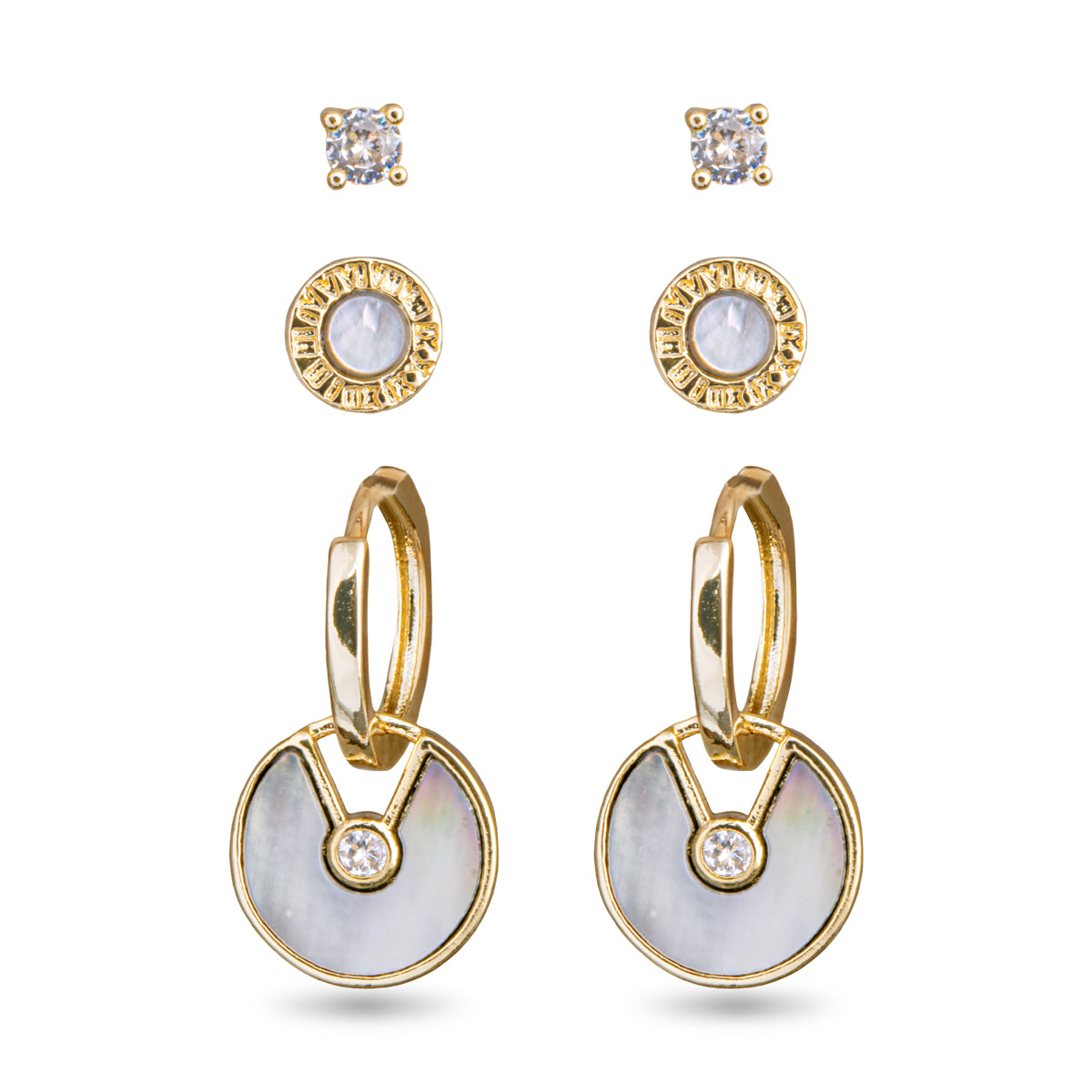 Set of three different pairs of earrings. The first pair has a small circular faux diamond or crystal look. The second pair are circles with gold on the outer part of the circle and mother of pearl in the center. The third pair are gold hoops that have a circular mother of pearl pendant dangling from them with a mother of pearl design and a small faux crystal in the center.