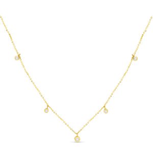 gold necklace with small clear gemstones spaced along the necklace