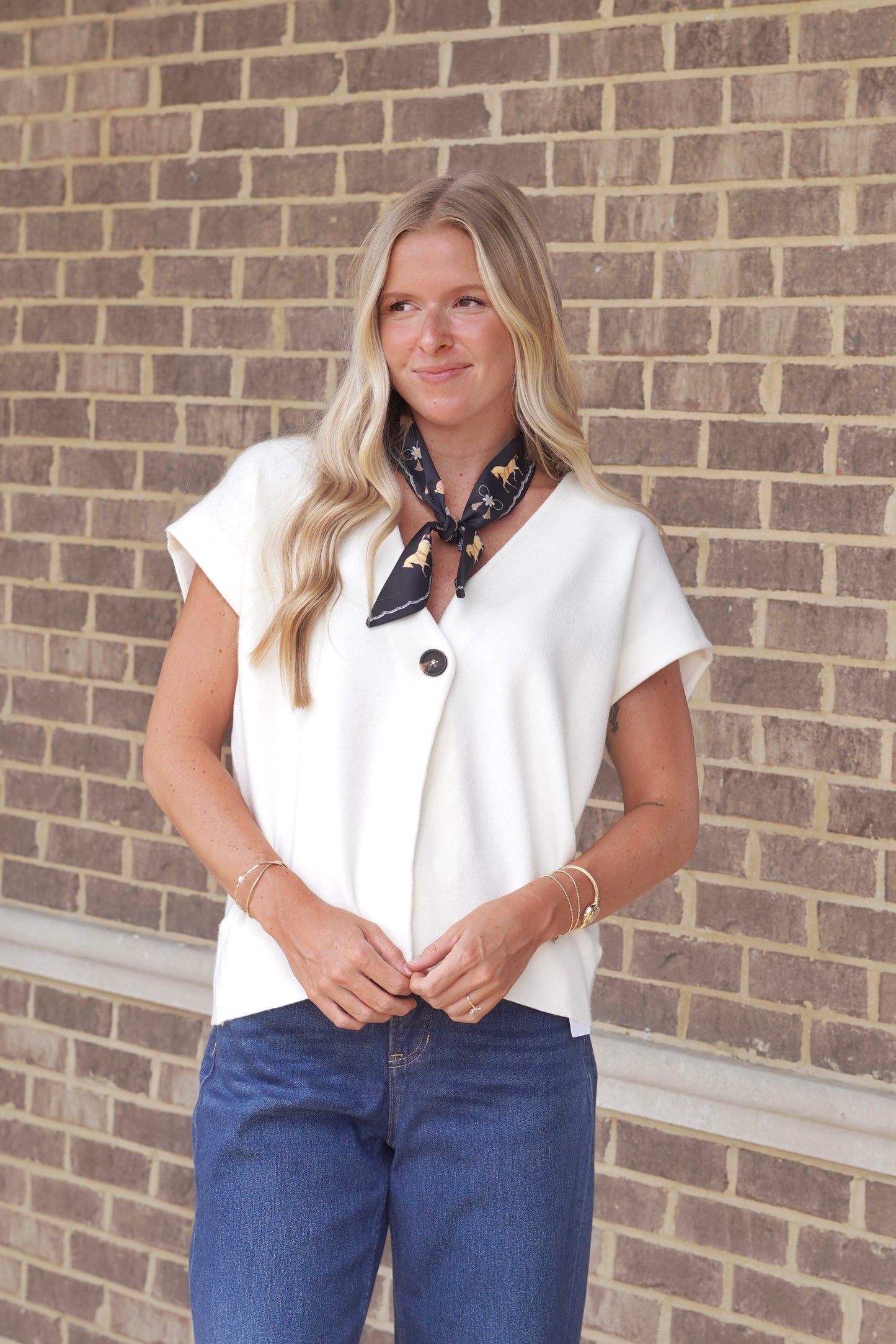 white button-front short sleeve sweater