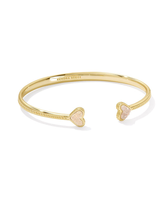 gold cuff bracelet with two hearts with iridescent drusy stone centers