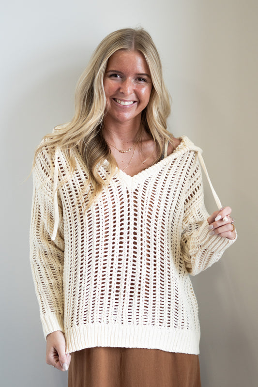 Olivia Open Knit Hooded Sweater Hooded Neckline Drawstrings Long Sleeves Open Knit Material Color/ Cream Waistline Length Relaxed Fit