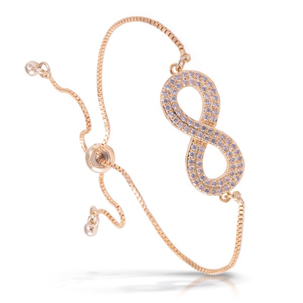 Gold bracelet with a Gold and blue crystal infinity sign on it that