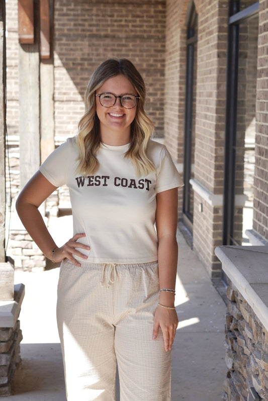 Cali Coast Tee
Crew Neckline
West Coast Graphic
Ivory
Cropped
95% Cotton, 5% Spandex
Hand wash only in cold water, lay flat to dry, no bleach