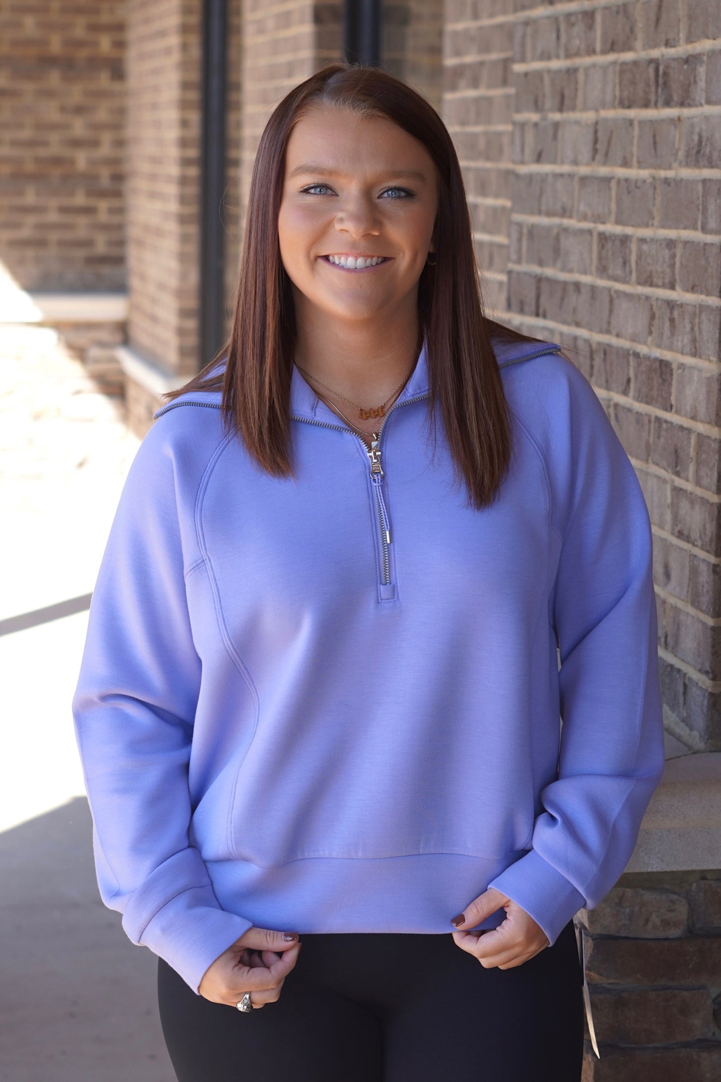 Women wearing a Amethyst Half Zip, Collar Neckline, Long Sleeve, Relaxed Fit