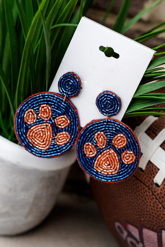Show your Paw Pride with these beautiful beaded earrings!! It's Football Season and you want everyone to know just who you root for, and these show just that!! Paw Pride Beaded Earring Stud Post. Navy and Orange beaded paw prints.