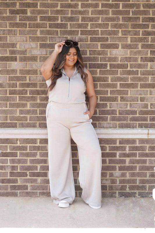 an ashwood jumpsuit with white piping detail, Sleeveless, zipper detailed top