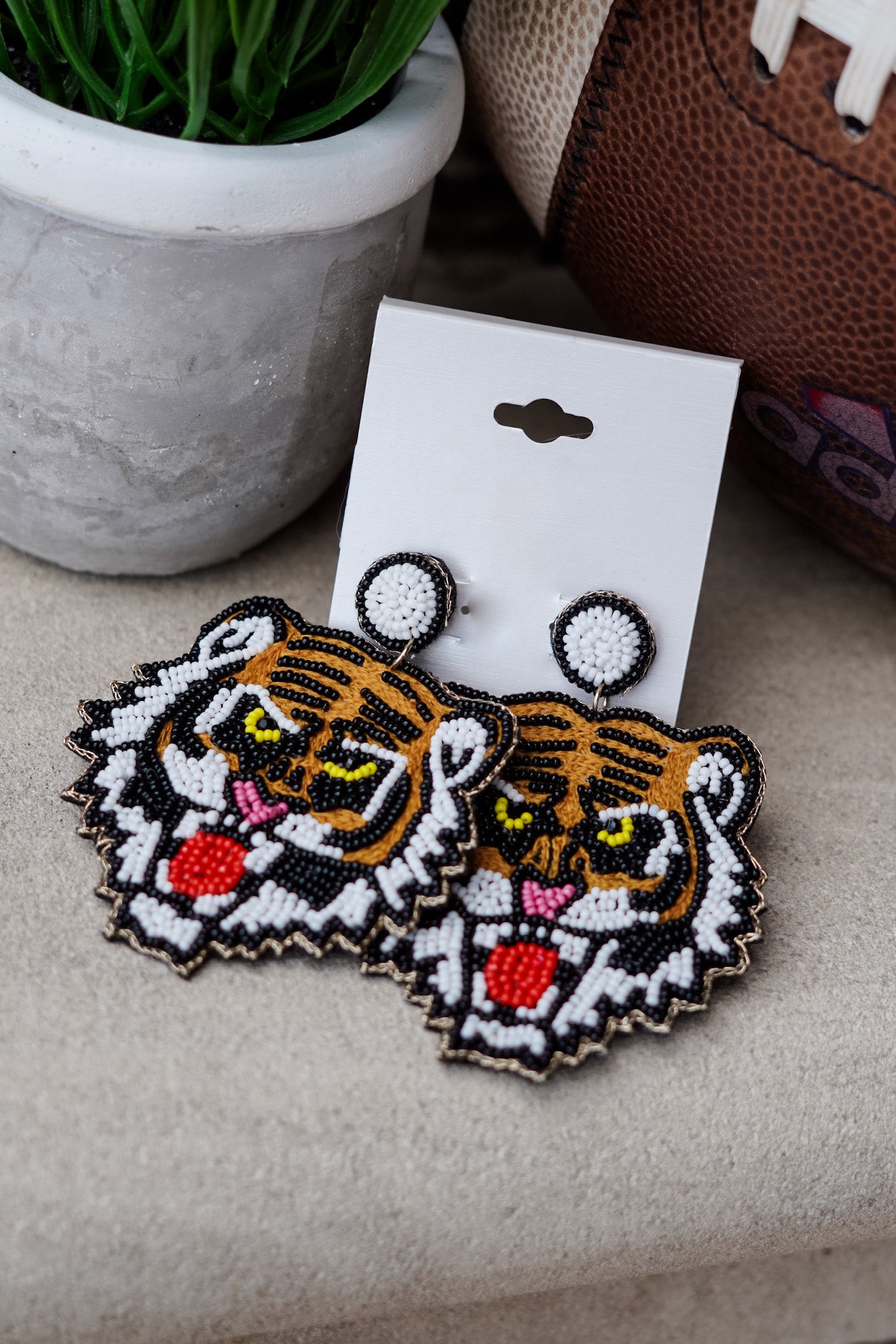 Whether you are a fan of Auburn or just love Tigers, these earrings will be a perfect addition to your outfit!! Fierce Tiger Embellished Earrings Stud Post Back. Orange tiger beaded earrings.