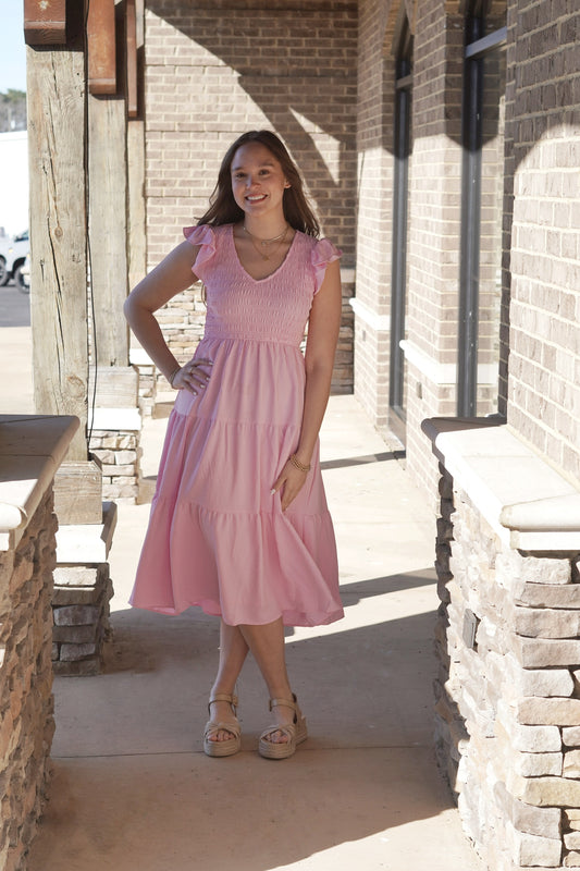 Maxi Pink Dress, Flutter Short Sleeve, V-Neckline, Elastic Material At Top, Tiered Ruffle At The Skirt Of Dress, Snitch At The Waist, Right Above Ankle Length