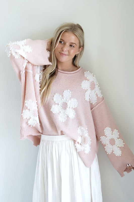 Felicity Floral Print Pearl Sweater Loose neckline Long Sleeve Cut Detail On Ends Of Fabric Pearl Detail Color: Baby Pink Loose Fit Full Length 100% Polyester