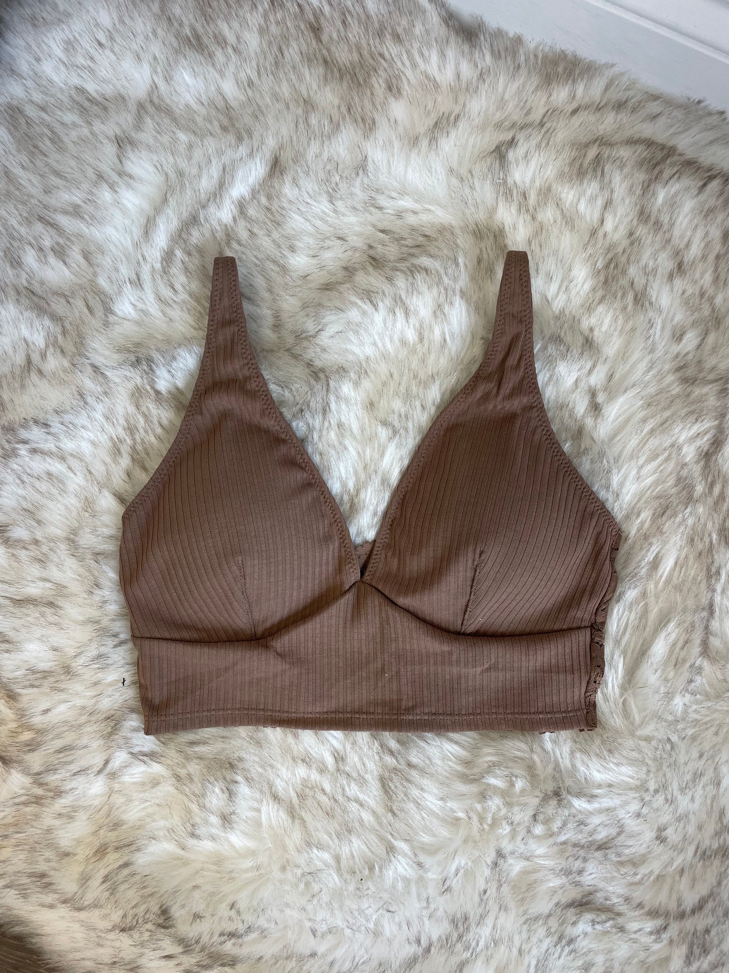 Rosie Ribbed Knit Bralette Deep V-Neckline Removable Padding Adjustable Spaghetti Straps Mocha Color Lace Back Detail 64.8% Polyester, 27.7% Rayon, 7.5% Spandex