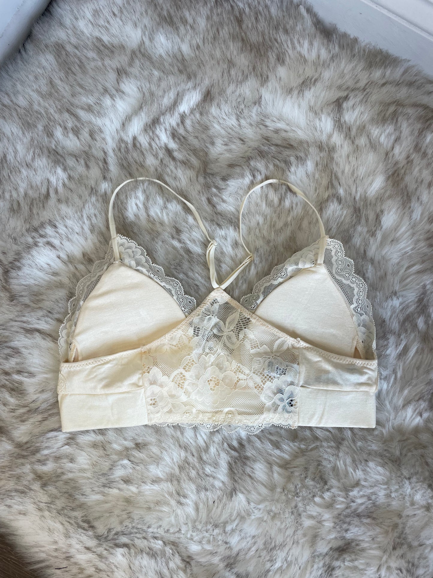 Lucky Lace Trim Bralette Deep V-Neckline Criss Cross Back Straps Adjustable Spaghetti Straps Elastic Band Lace Trim Lace Detail on Back Removable Bra Padding 95% Rayon, 5% Spandex