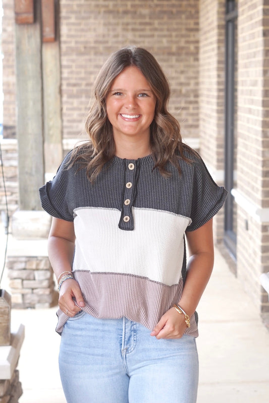 black, cream, and cocoa color block to, short sleeves, half button up, crew neck