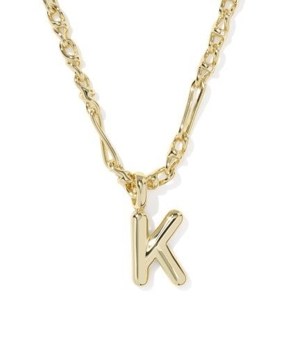 A gold initial necklace featuring a polished letter 'K' pendant on a twisted link chain, shown against a plain white background.