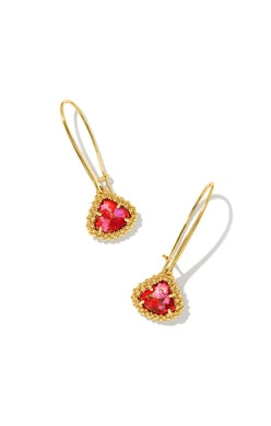 Our customer-favorite Kendall shape from Fall 2022 returns, now with an organically textured frame and faceted stone. With their wire drops and striking shape, the Framed Kendall Gold Wire Drop Earrings in Bronze Veined Red and Fuschia Magnesite will be your go-to lightweight statement. Dimensions 1.8'L X 0.63'W GOLD BRONZE