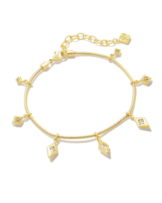 With its textured detailing and eye-catching sparkle, the Kinsley Gold Delicate Chain Bracelet in White Crystal is bound to be a wrist stack favorite. Diamond-cut crystal charms shine along a delicate chain, giving off a vintage glamour we’re obsessed with.