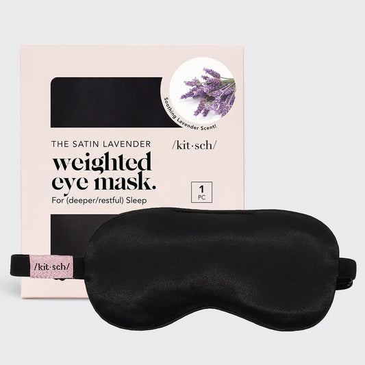 Lavender Weighted Satin Eye Mask. Self care at its finest, the luxurious satin fabrication is designed to care for your skin, and help you sleep comfortably, all while looking chic! Weighted function may help ease tension headaches promote deeper sleep while enjoying the fresh scent of the mask's real dried lavender seed filling. Includes adjustable fit elastic strap