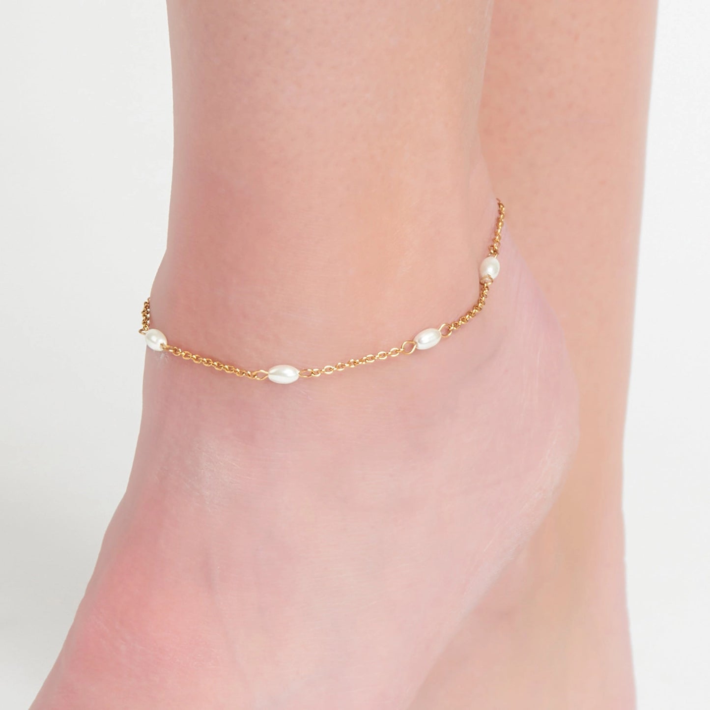 Pearl Anklet a singular delicate chain in a classic gold with pearl accents