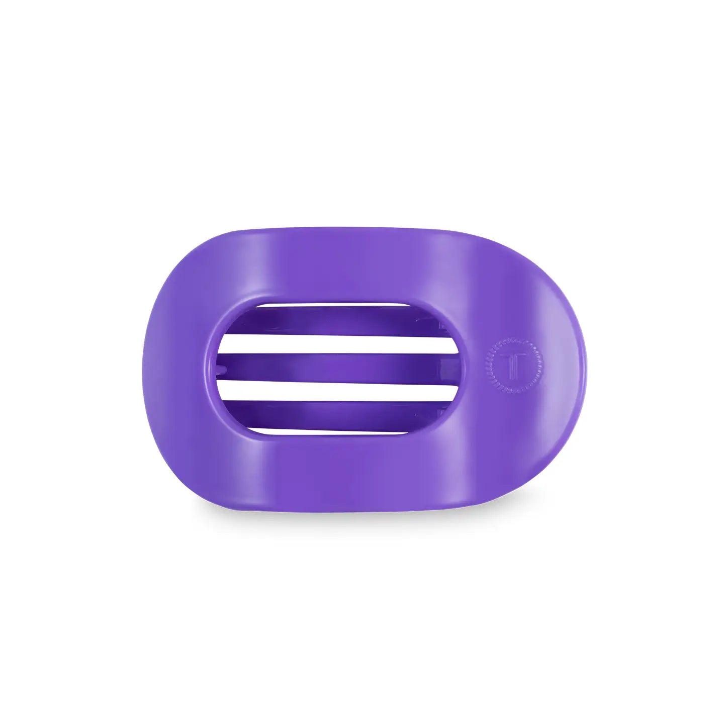 small flat round hair clip in a purple color