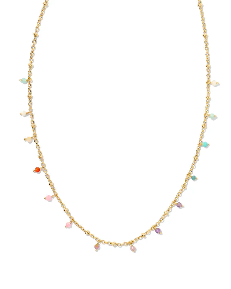 gold necklace with small multi colored stone charms Metal14k Yellow Gold Over Brass Materialaqua apatite, ivory mother of pearl, teal amazonite, orange agate, light yellow mother of pearl, peony ivory mother of pearl, lilac phosphate, variegated turquoise magnesite, amethyst ClosureLobster Clasp With Single Adjustable Sliding Bead Size19" Chain, 0.08"L X 0.08"W Pendant