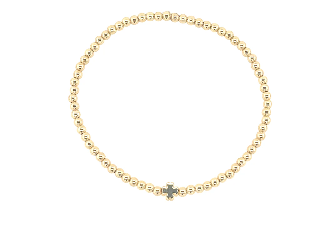 Clover Charm Gold Filled beaded Bracelet BALL BEAD MATERIALS: 14K GOLD FILLED, STERLING SILVER OR ROSE GOLD PENDANT MATERIAL: 18KG PLATED ON STERLING SILVER (GOLD ONLY) STONES: CUBIC ZIRCONIA STRETCHY LENGTH: 6.5" OR 7"