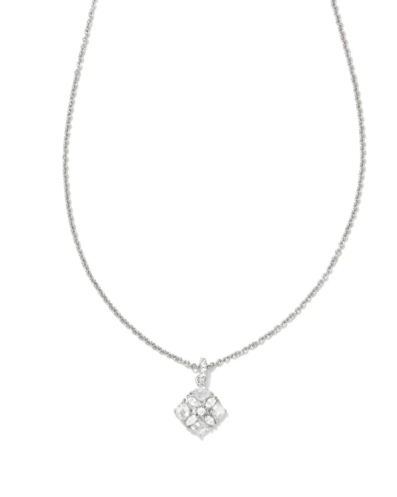silver necklace with white crystalized flower pendant
