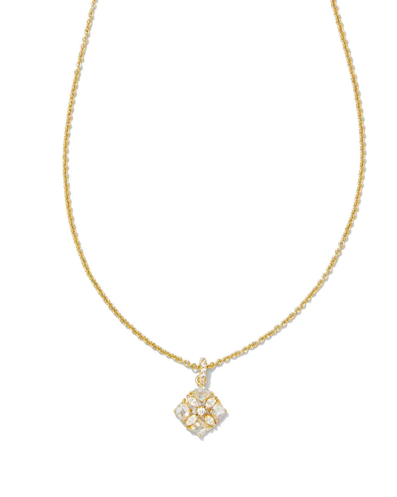 gold necklace with white crystalized flower charm