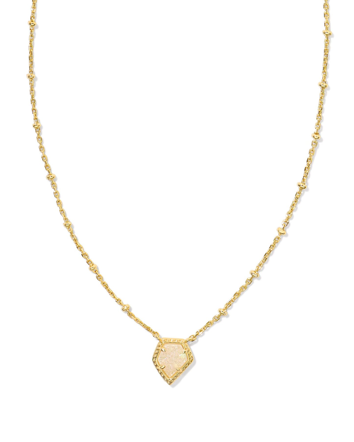 gold necklace with a detailed beaded chain, geometric shaped pendant, iridescent shaped stone