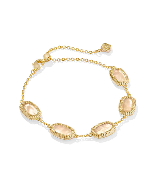 <h3>Metal</h3> <p>14k Yellow Gold Over Brass</p> <p><br></p> <h3>Material</h3> <p>Golden Abalone</p> <p></p> <p><br></p> <h3>Closure</h3> <p>Lobster Clasp W/ Single Adjustable Slider Bead</p> <p><br></p> <h3>Size</h3> <p><span>8"L , 0.36"W</span></p> chain bracelet with golden abalone stones