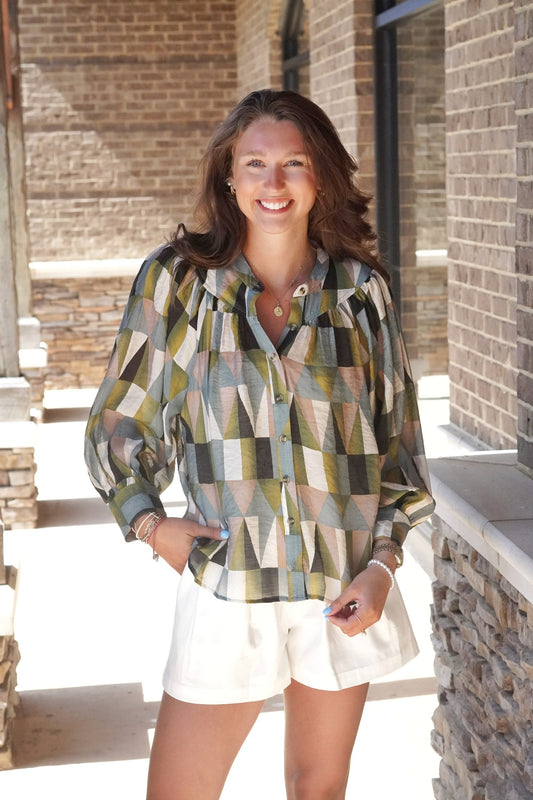 Jenny Geometric Long Sleeve Blouse Collared Neckline Long Cuffed Sleeves Button Up Feature Color: Muted Color Geometric Design (Green, Black, White, Blue, Brown) Full Length Relaxed Fit 30% Nylon, 70% Viscose