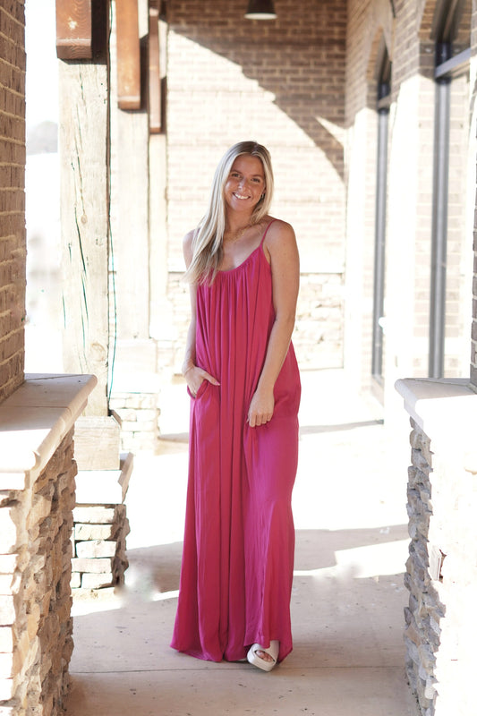 <ul> <li>Havana Hot Pink Maxi Dress</li> <li>Round Neckline</li> <li>Spaghetti Straps</li> <li>Adjustable Straps</li> <li>Long Flowy Maxi Dress</li> <li>Color: Hot Pink</li> <li>Side Pockets</li> <li>100% Polyester</li> </ul>