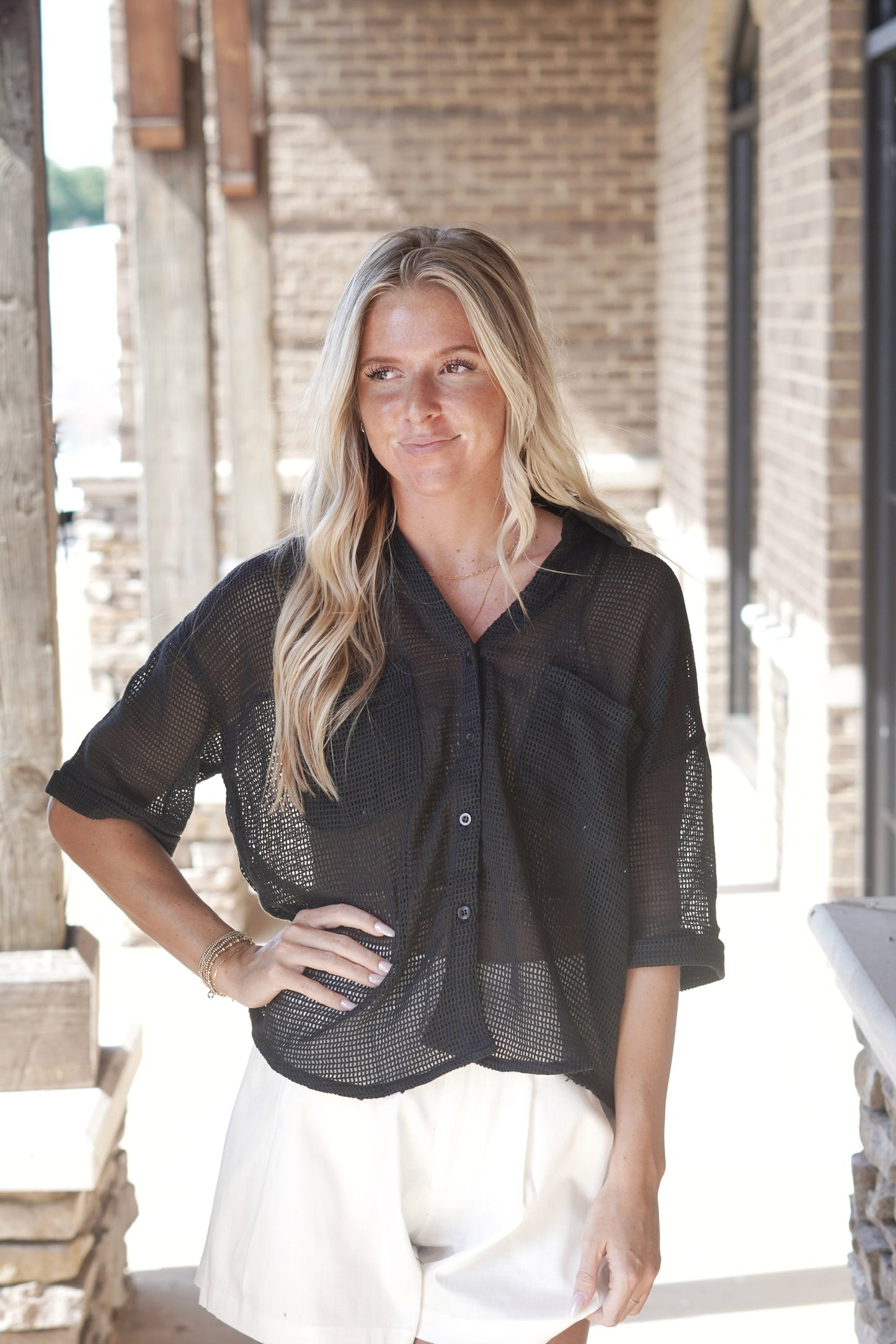 Nance Knit Sheer Button Up Top Collared Neckline Short Sleeves Knit Sheer Material Color: Black Button Up Feature Front Pockets Full Length Relaxed Fit 100% Cotton