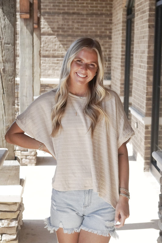 Tara Textured Relaxed Top Crew Neckline Short Sleeves Textured Material Relaxed Fitt Full Length 60% Polyester, 35% Cotton, 5% Polyester oatmeal color