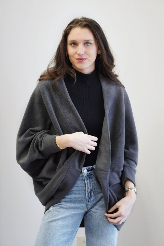 Commuter Fleece Cardigan Oversized fit 60% Cotton, 28% Polyester, 12% Rayon Open front cardigan Curve hem Colors: Asphalt, Front seam detail Mid-weight fleece Care: Wash Cold, Hang Dry