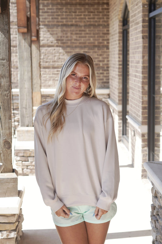 Scuba Mock Neck Pullover Crew Neckline Long Sleeves Relaxed Fit Colors: Cream f Full Length Fabric Content: 48% Modal, 45% Polyester, 7% Spandex