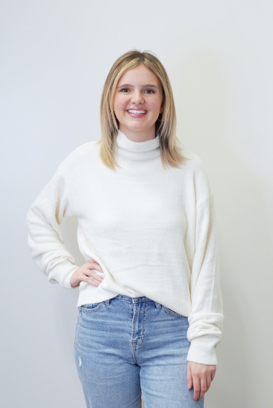 Nelly Knit Turtleneck Sweater Turtleneck Long Cuffed Sleeves Colors: Cream,Relaxed Fit Full Length 90% Nylon, 10% Polyester