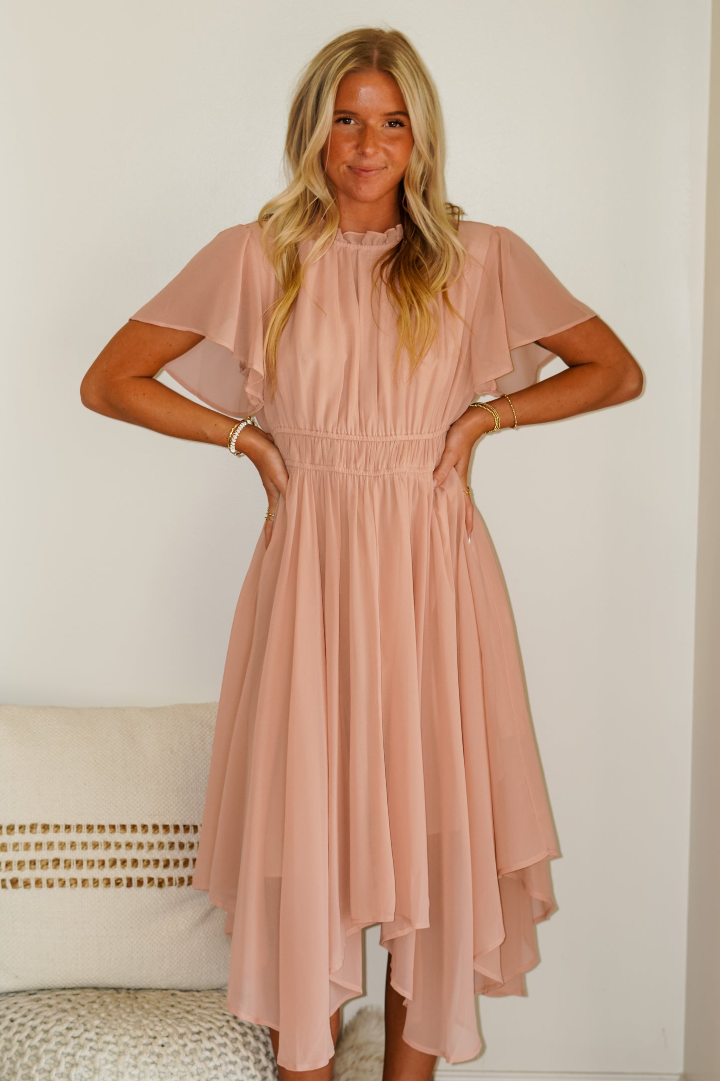 Faith Flowy Sleeve Dress Color: Peach/ White Round Ruffle Neck Line Flowy Short Sleeves Midi Length 100% Polyester Lining, 65% Rayon, 35% Polyester